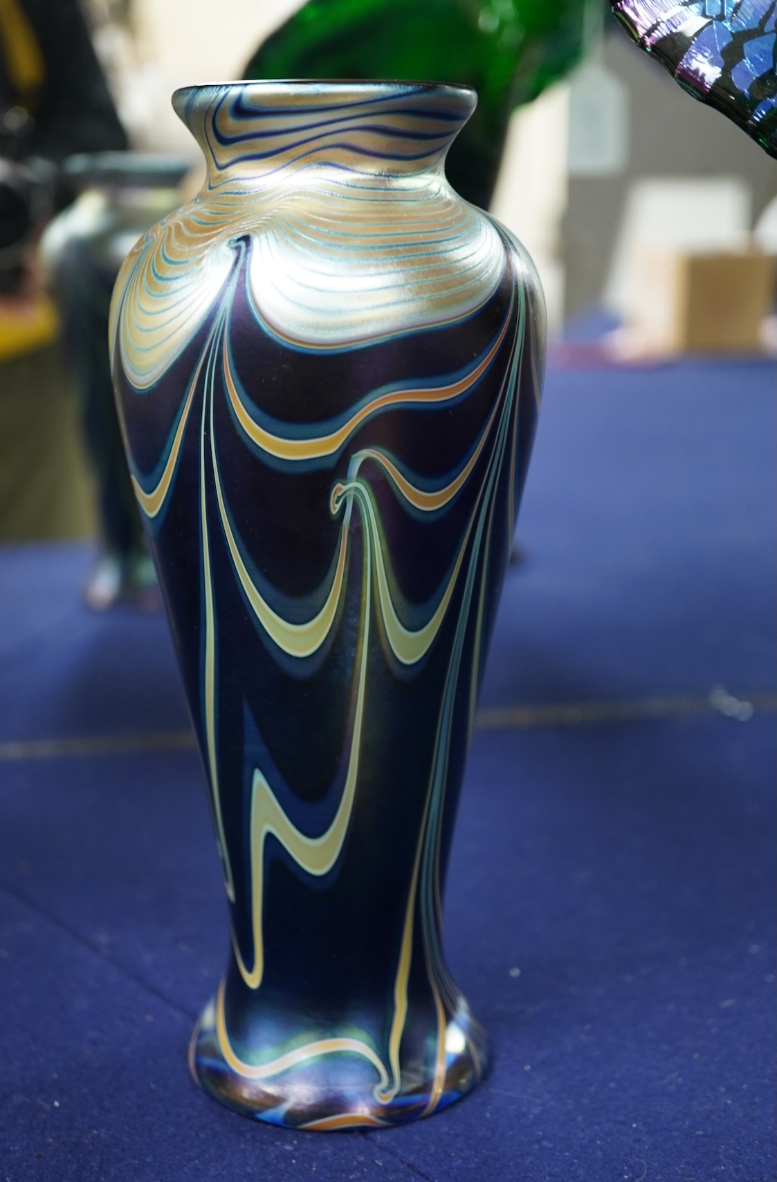An Isle of Wight iridescent glass vase, Richard Golding Okra Luxor vase and Jack in Pulpit the box vase (3) tallest 38.5cm